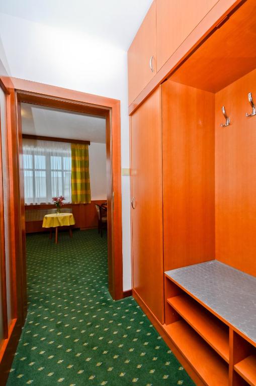 Postel nebo postele na pokoji v ubytování Hotel Kotyza