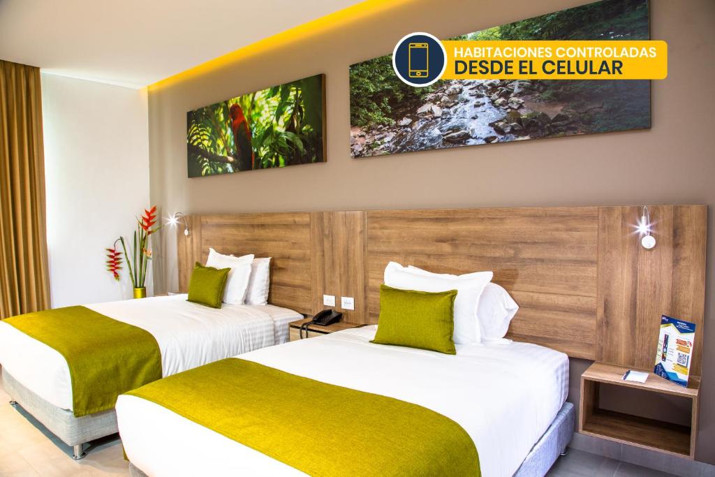 Cama o camas de una habitación en Hotel Pance 122 Wellness Spa