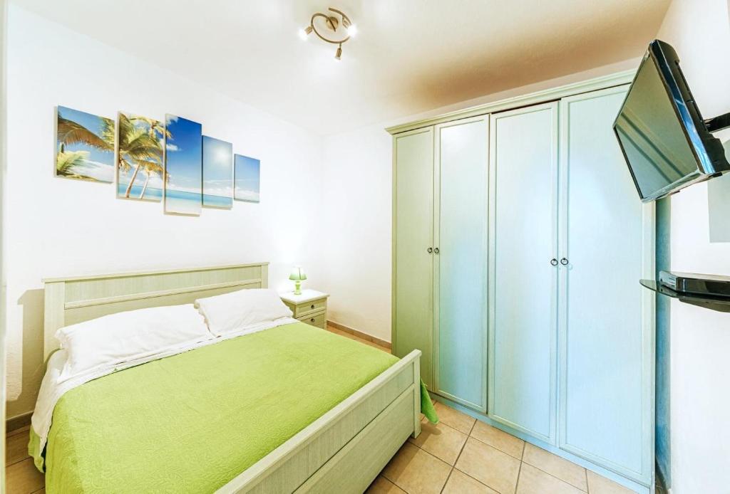 A bed or beds in a room at Appartamenti Ischia Casa Don Peppe
