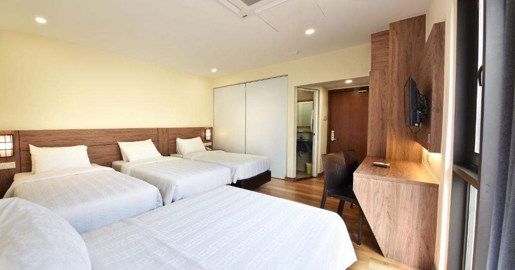 Postel nebo postele na pokoji v ubytování YANGTZE HOTEL 长江酒店