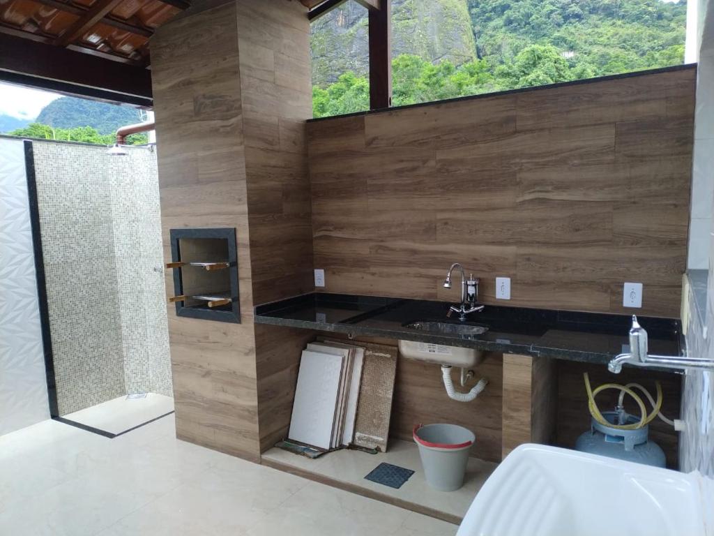Kuchyň nebo kuchyňský kout v ubytování Mangaratiba (casa mobiliada)