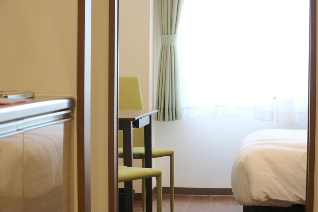 Postel nebo postele na pokoji v ubytování Best ever hotel
