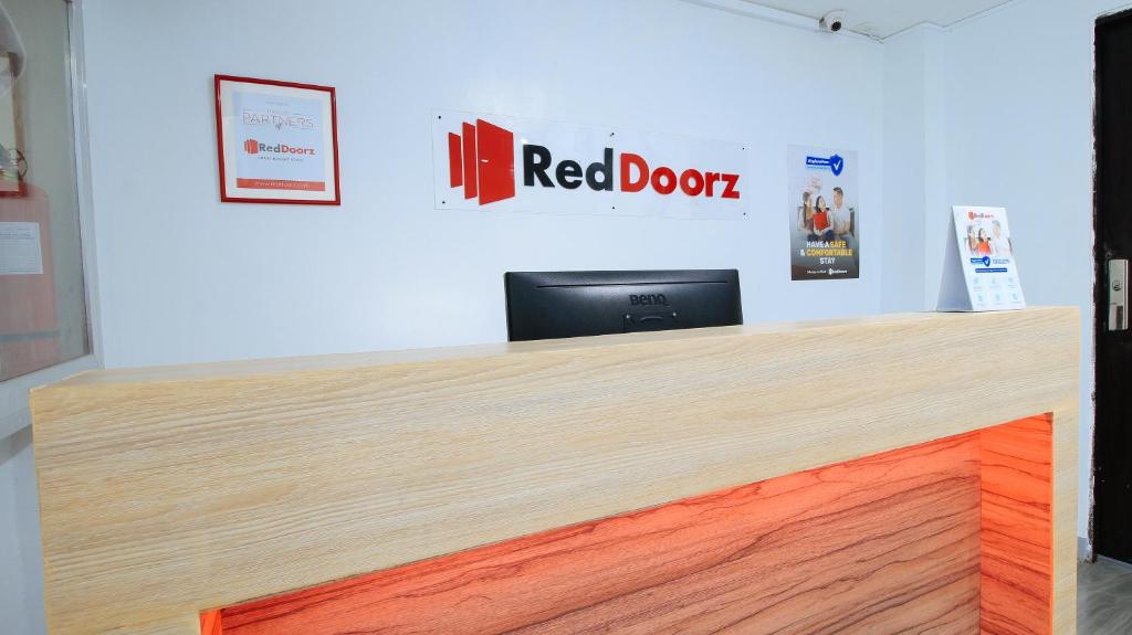 TV a/nebo společenská místnost v ubytování RedDoorz near Zobel Roxas St