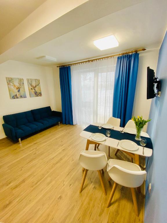 TV a/nebo společenská místnost v ubytování Resort Rybníček