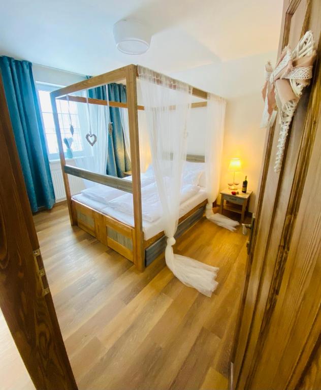 Postel nebo postele na pokoji v ubytování Resort Rybníček