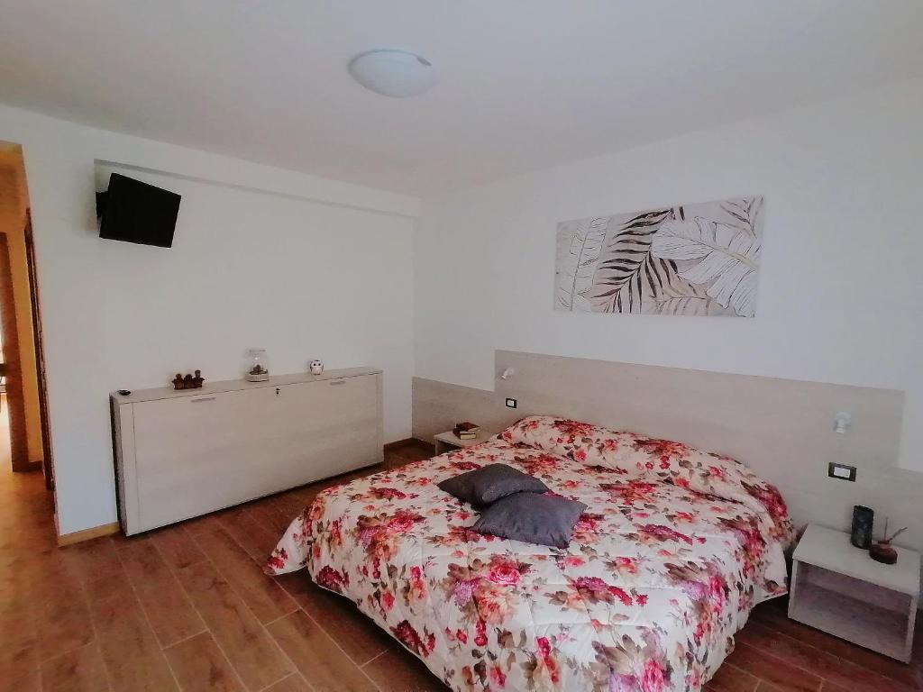 Llit o llits en una habitació de Ca' dei Berici Residence Apartments