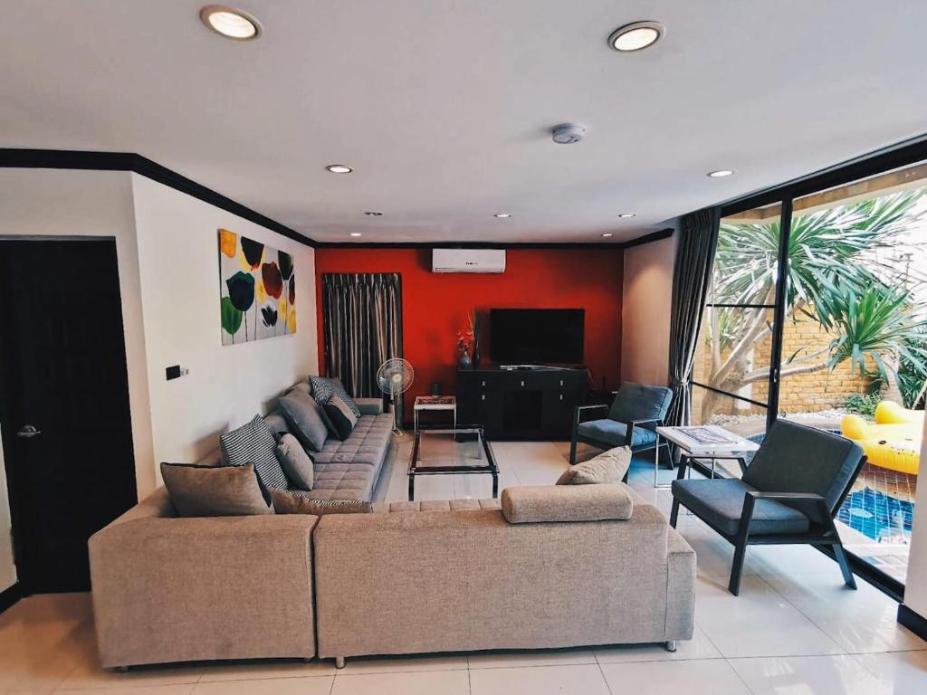 Posezení v ubytování 4poolvillas