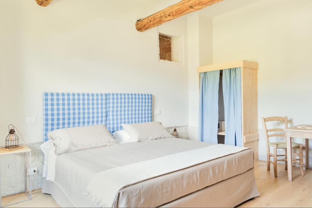 Postel nebo postele na pokoji v ubytování CUGUSI BnB