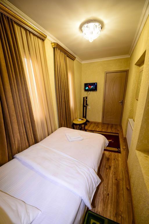 Postel nebo postele na pokoji v ubytování HOTEL VLADi