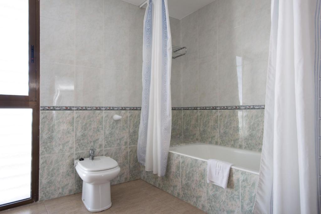 Koupelna v ubytování Hotel Rosi