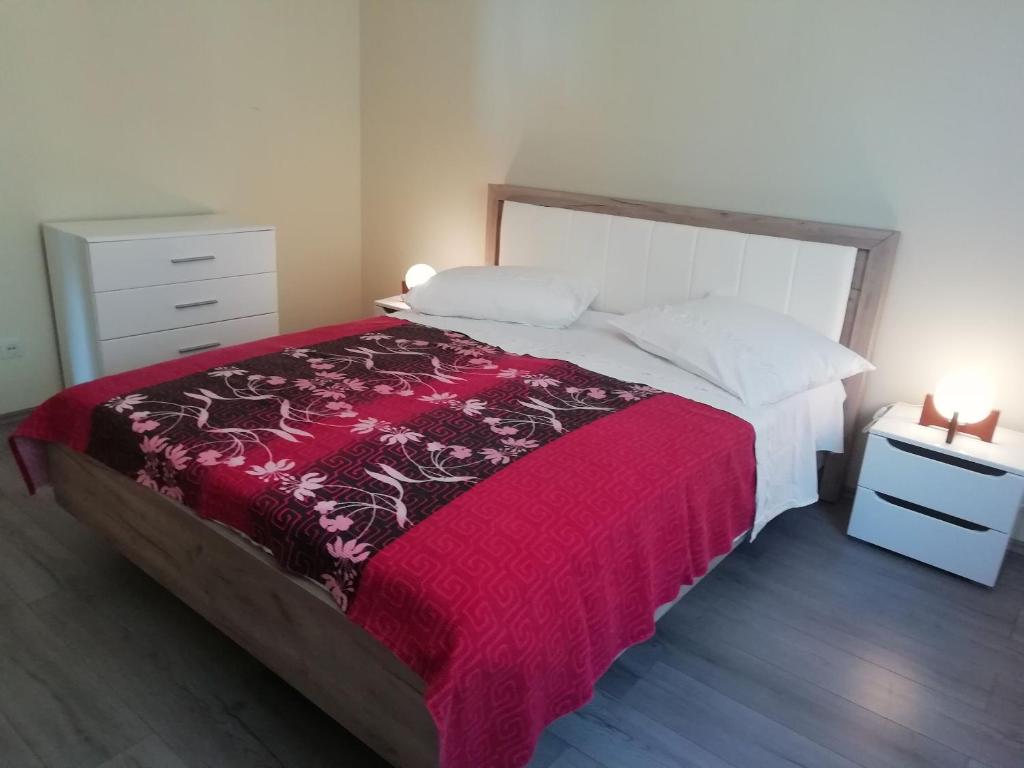 Postel nebo postele na pokoji v ubytování Apartments Ivan