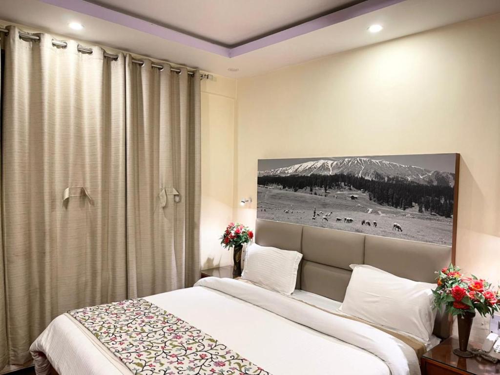 Postel nebo postele na pokoji v ubytování Hotel Centre Point