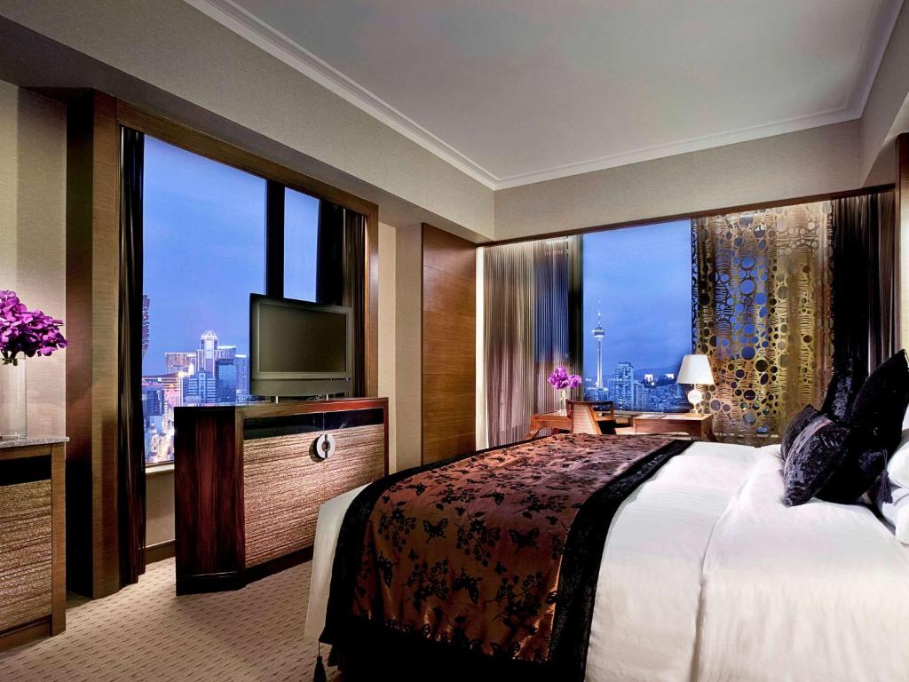 Postel nebo postele na pokoji v ubytování Sofitel Macau At Ponte 16