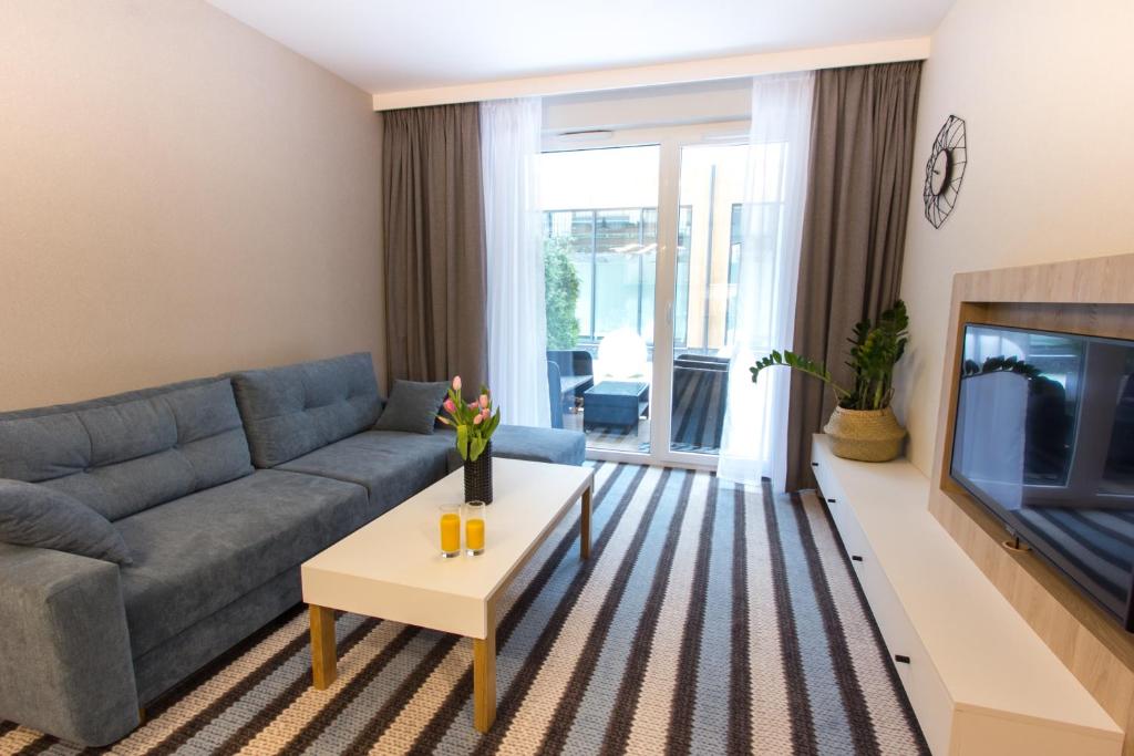 Posedenie v ubytovaní Bel Mare Apartament 128 z ogródkiem