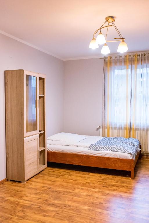 Posteľ alebo postele v izbe v ubytovaní Pokoje Gościnne u Meresa