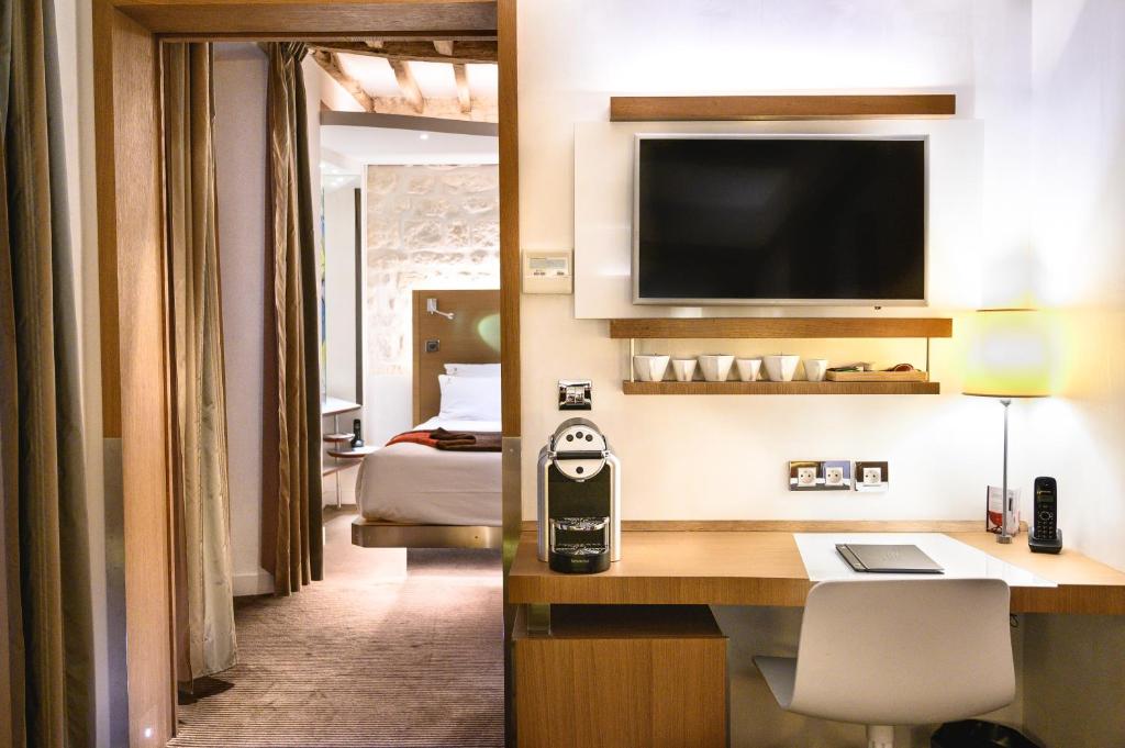 TV a/nebo společenská místnost v ubytování Select Hotel
