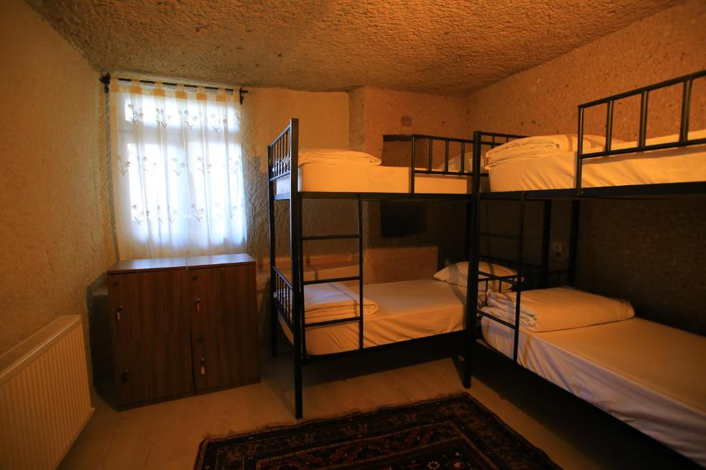 Postel nebo postele na pokoji v ubytování DIADEM CAPPADOCIA GUEST HOUSE & HOSTEL