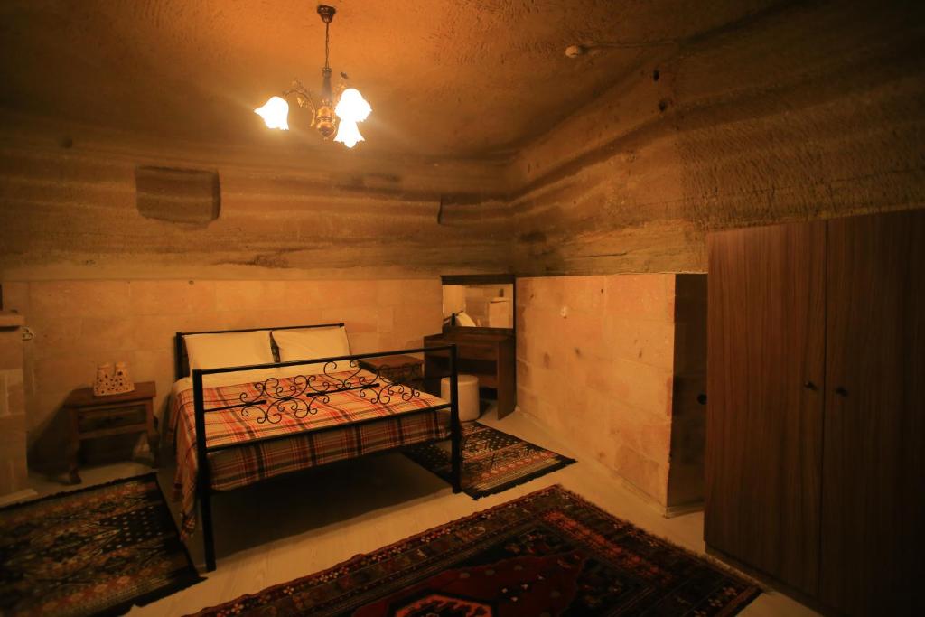 Postel nebo postele na pokoji v ubytování DIADEM CAPPADOCIA GUEST HOUSE & HOSTEL