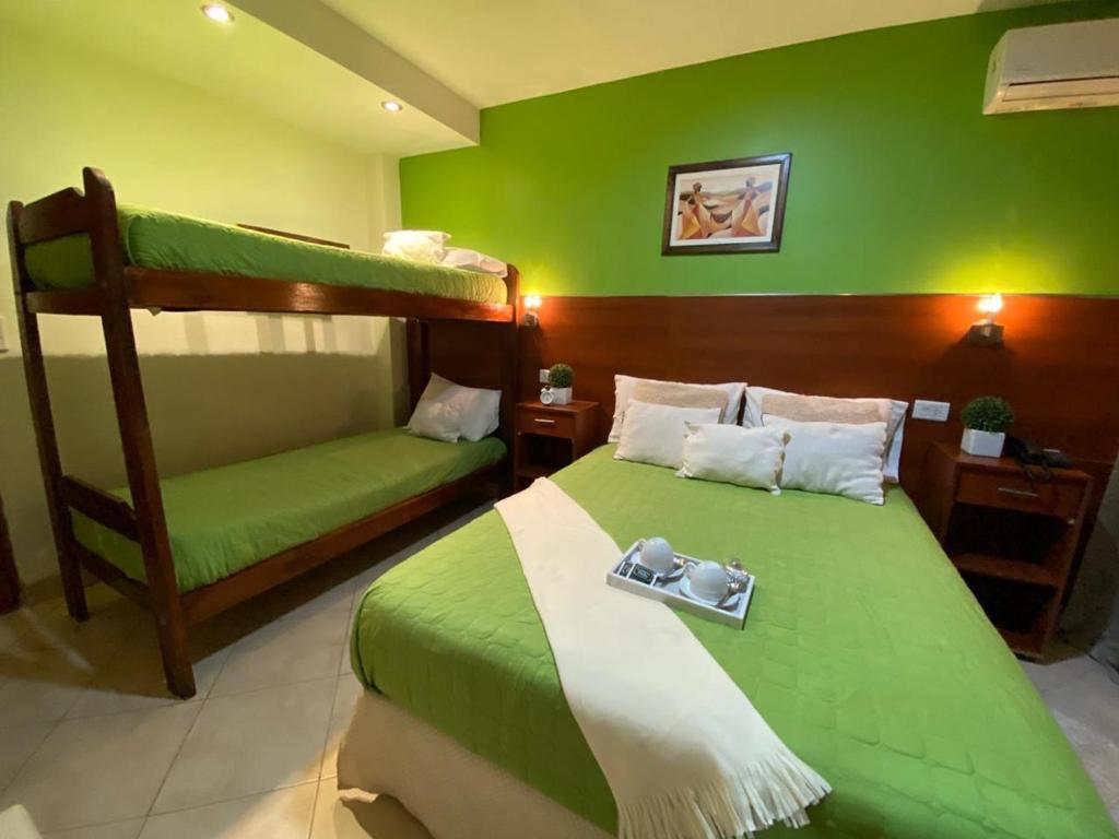 Postel nebo postele na pokoji v ubytování Hostal Alto Ayre Salta