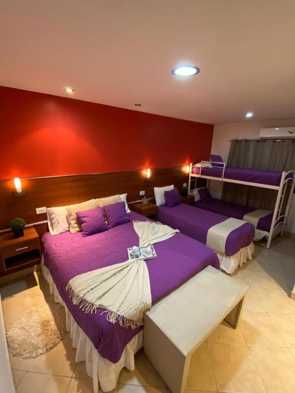 Postel nebo postele na pokoji v ubytování Hostal Alto Ayre Salta