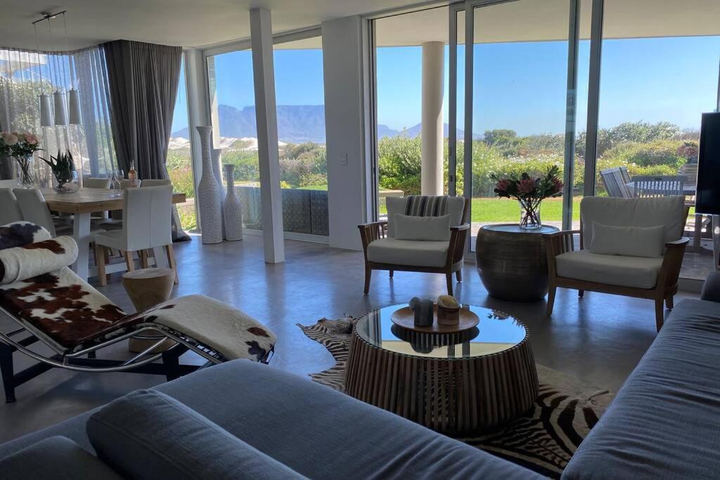 Dolphin Beach Villa E24 direct access to the beach, Cape Town (updated