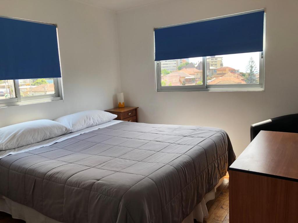 Postel nebo postele na pokoji v ubytování Hostal Recreo