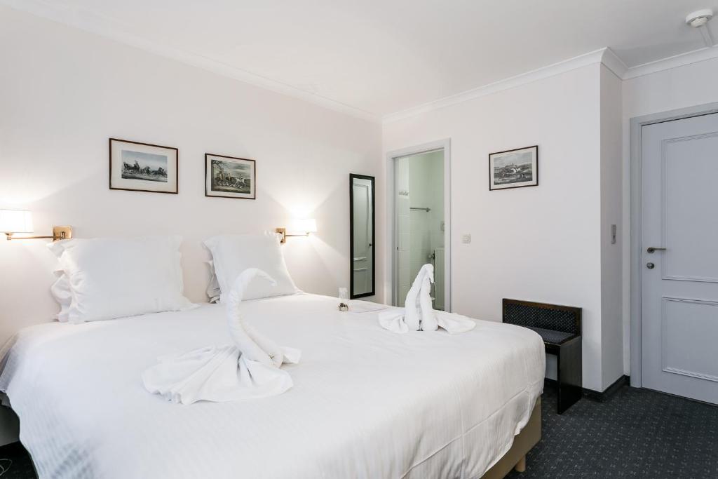 Postel nebo postele na pokoji v ubytování Hotel Bryghia