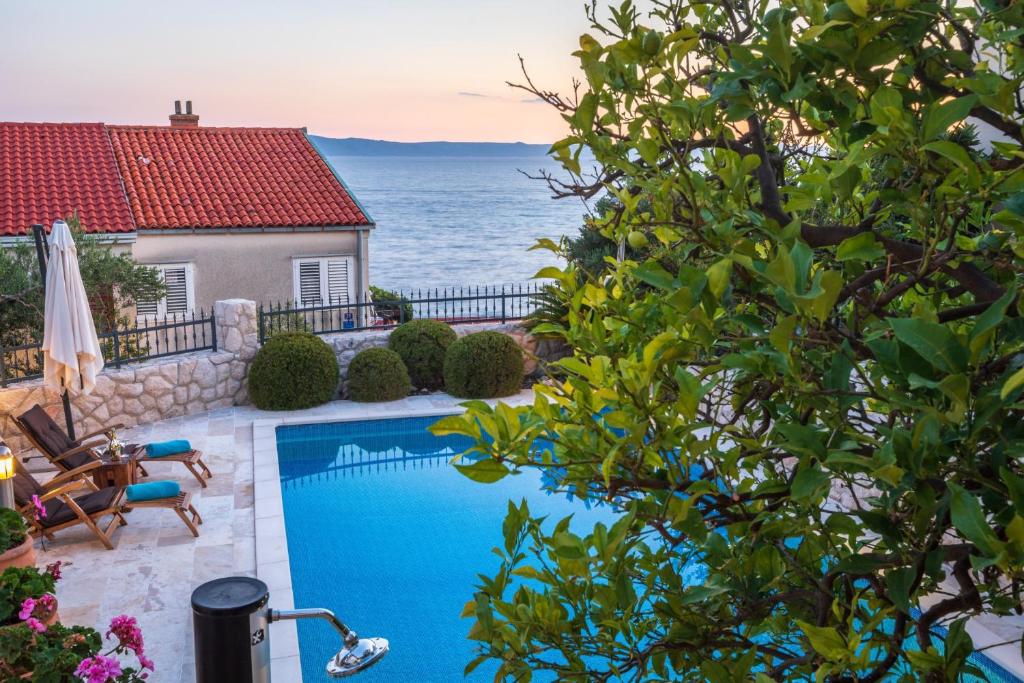 Bazén v ubytování Villa OLD OLIVE, 3lovelyvillas nebo v jeho okolí