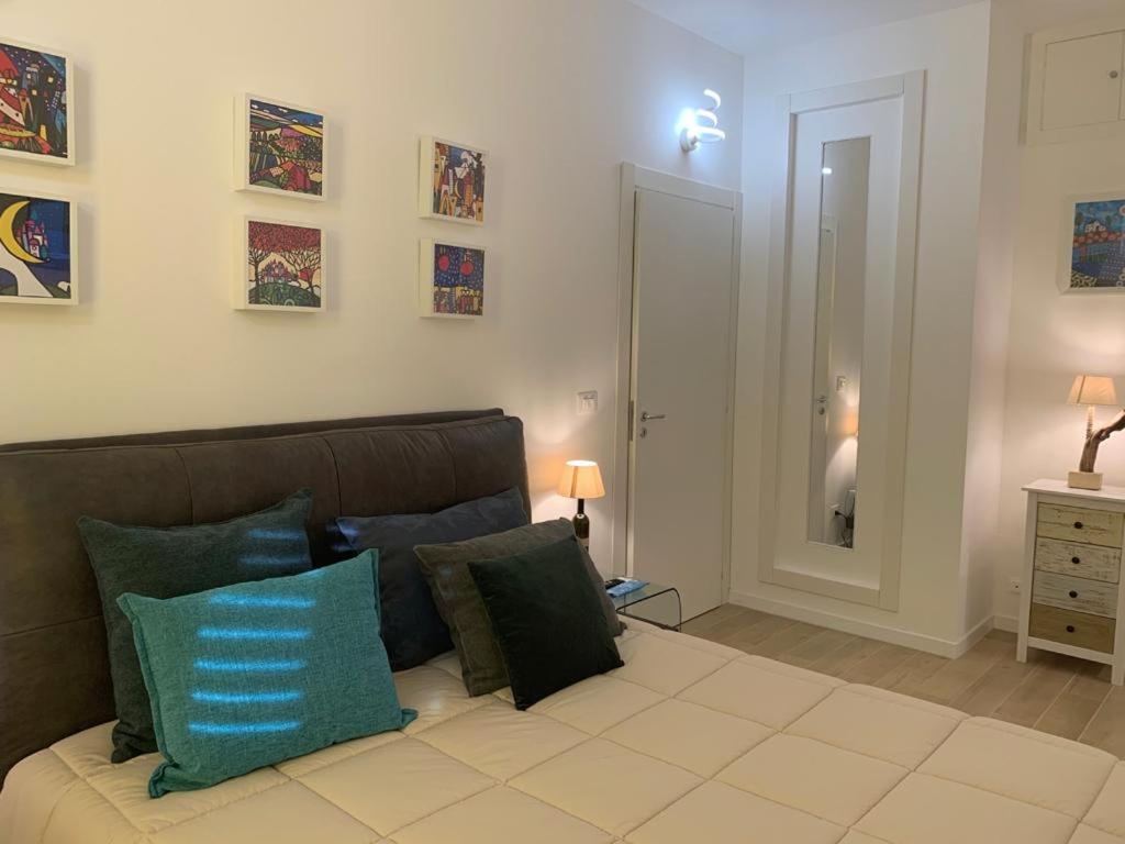 Posteľ alebo postele v izbe v ubytovaní Le Dimore del Gufo B&B and Apartments Suite