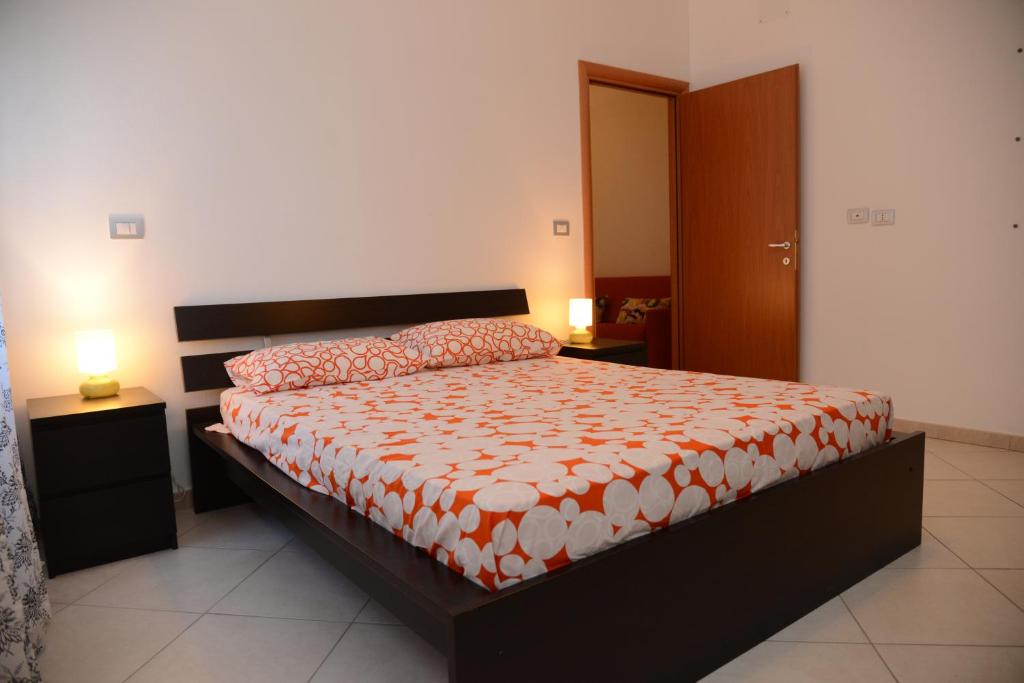 Postel nebo postele na pokoji v ubytování Jonico Guest House