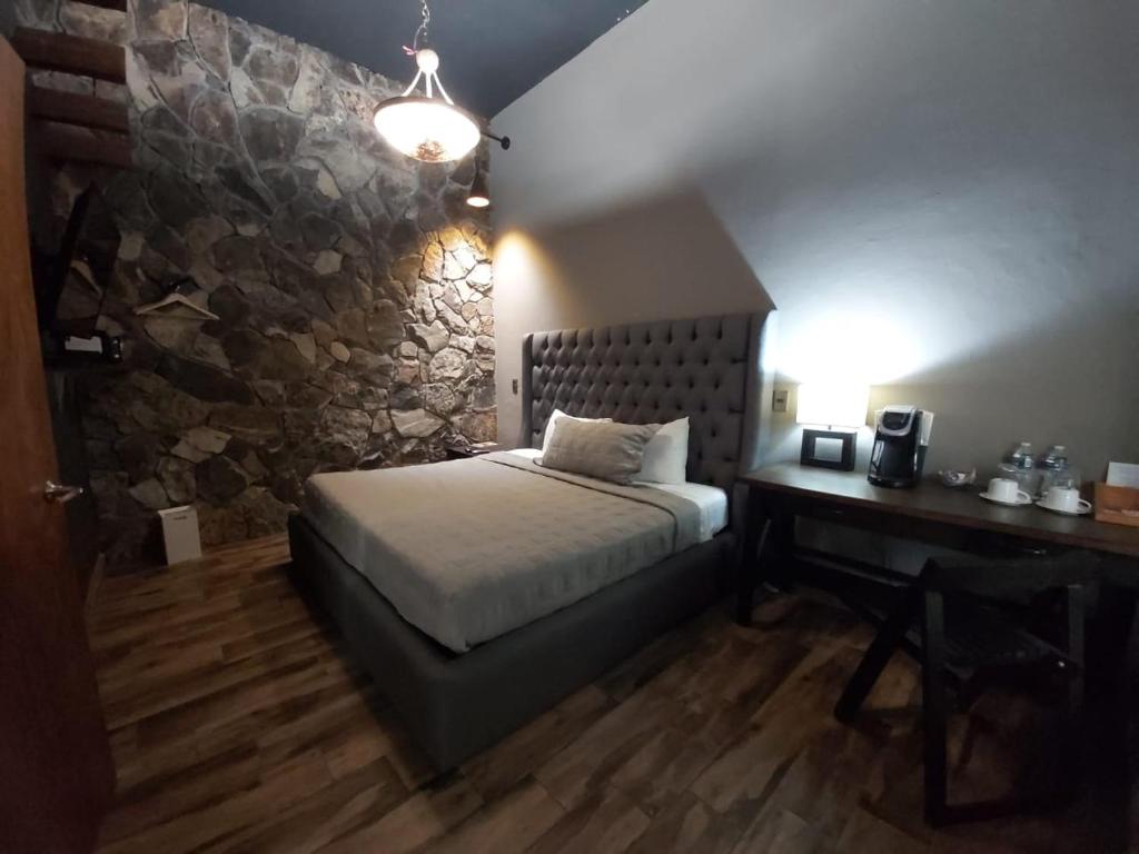 Postel nebo postele na pokoji v ubytování Independencia Dos 7 Hotel Boutique