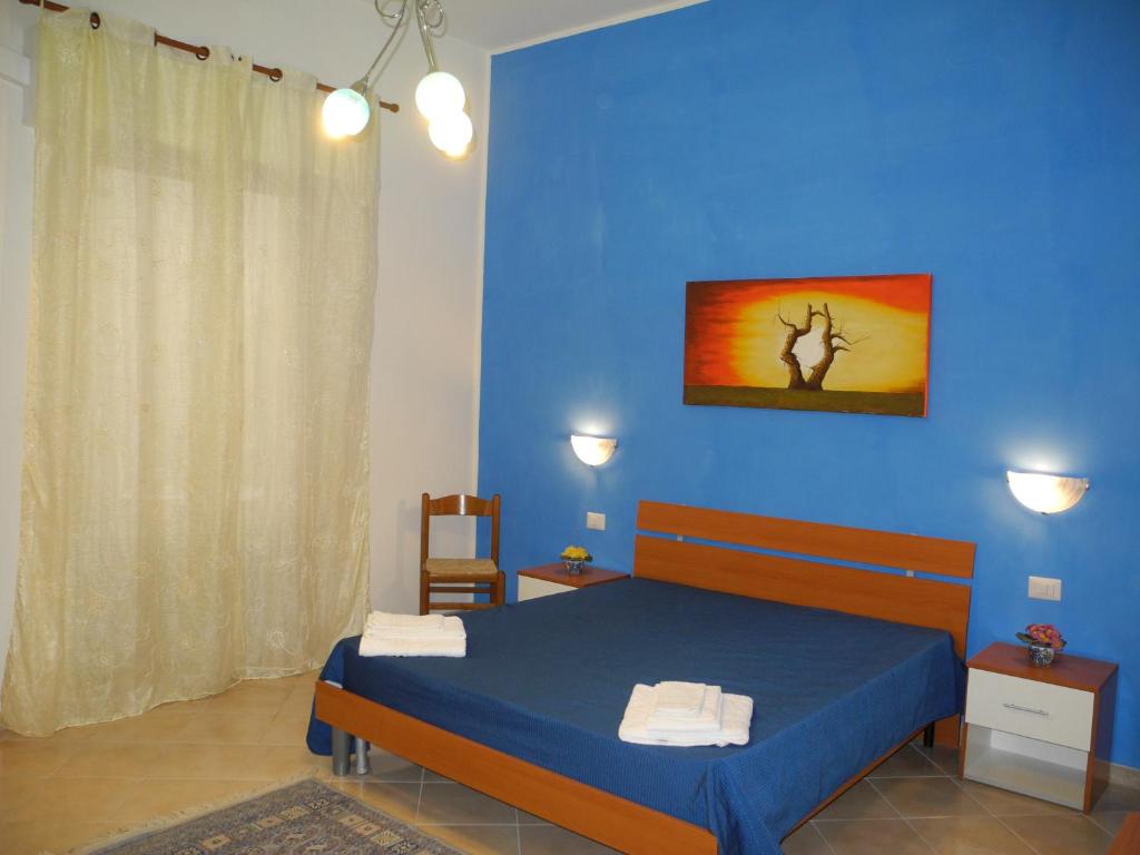Postel nebo postele na pokoji v ubytování CASA Melone Giallo