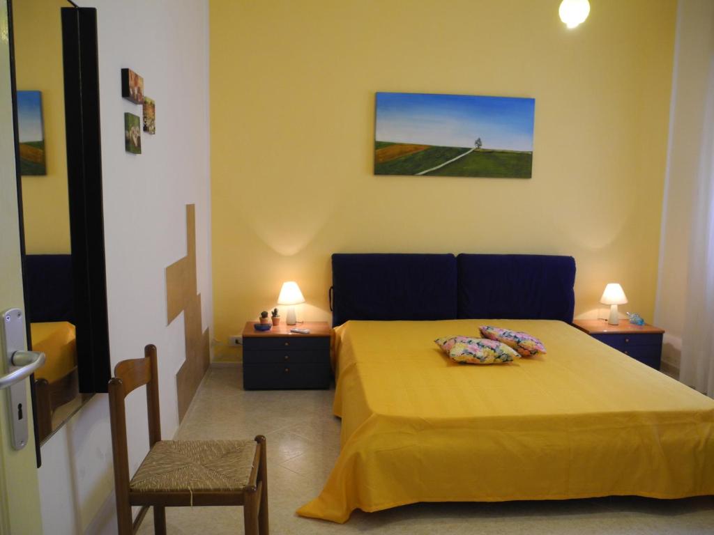 Postel nebo postele na pokoji v ubytování CASA Melone Giallo