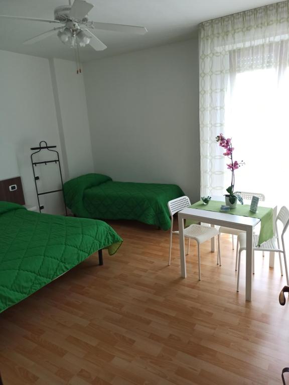 Posteľ alebo postele v izbe v ubytovaní Like Home Cisanello