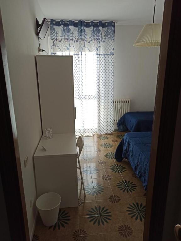 Posteľ alebo postele v izbe v ubytovaní Like Home Cisanello