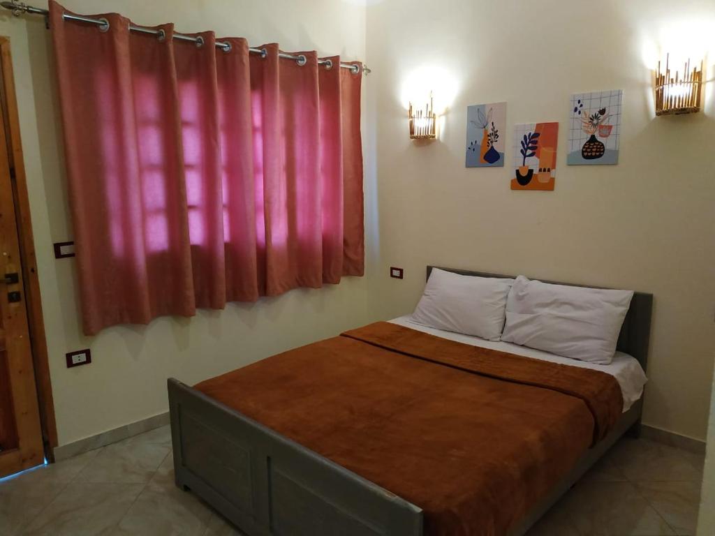 Postel nebo postele na pokoji v ubytování Happy Land Hotel Dahab