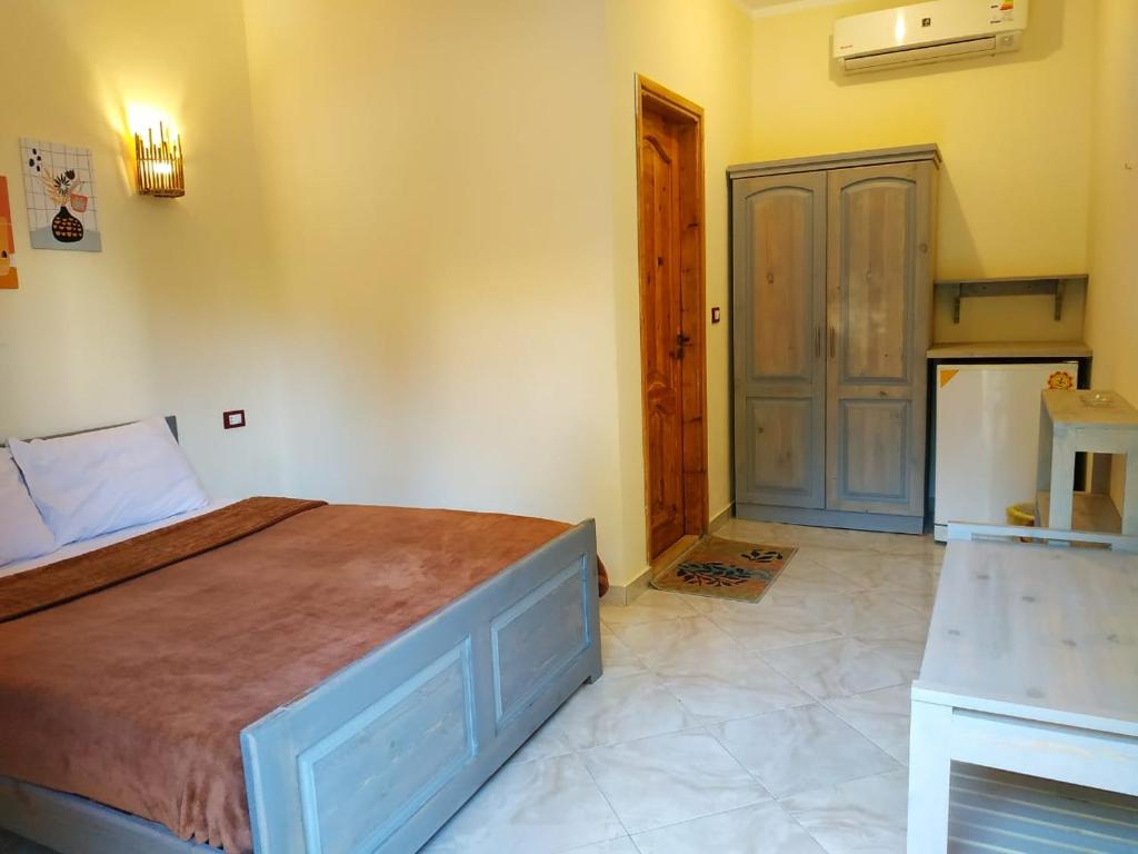 Postel nebo postele na pokoji v ubytování Happy Land Hotel Dahab