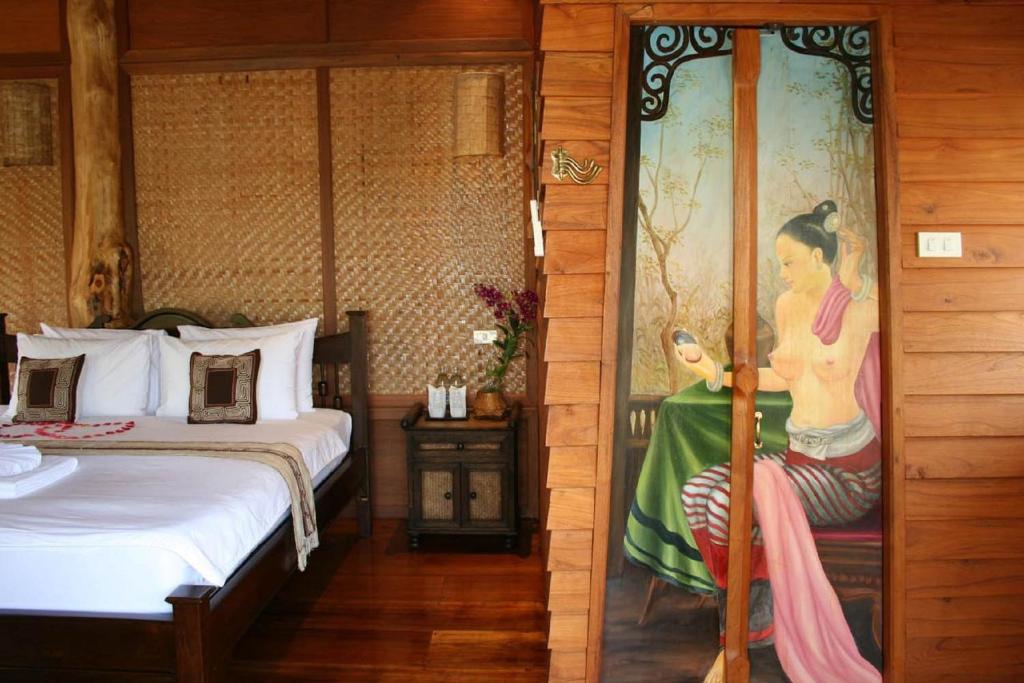 Postel nebo postele na pokoji v ubytování Pai Vimaan Resort