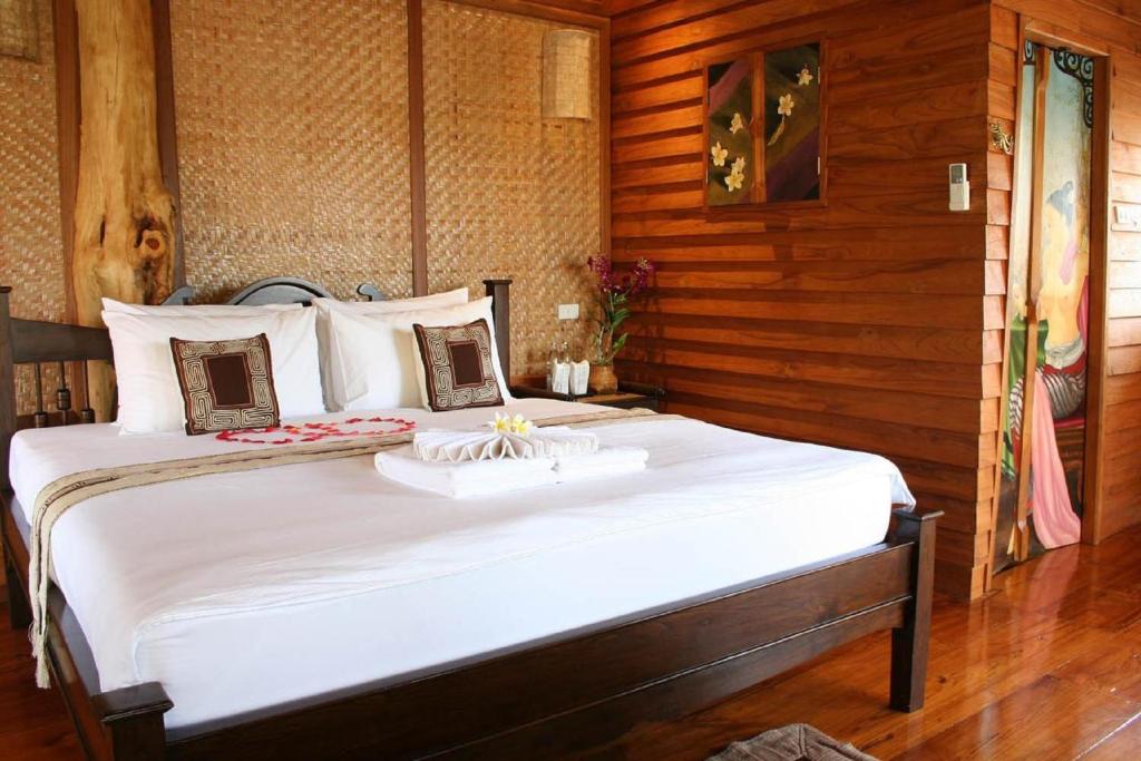 Postel nebo postele na pokoji v ubytování Pai Vimaan Resort