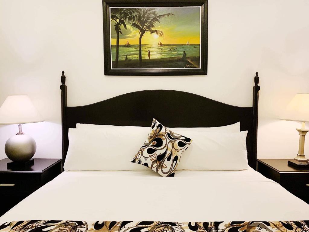 Postel nebo postele na pokoji v ubytování Chateau De Boracay
