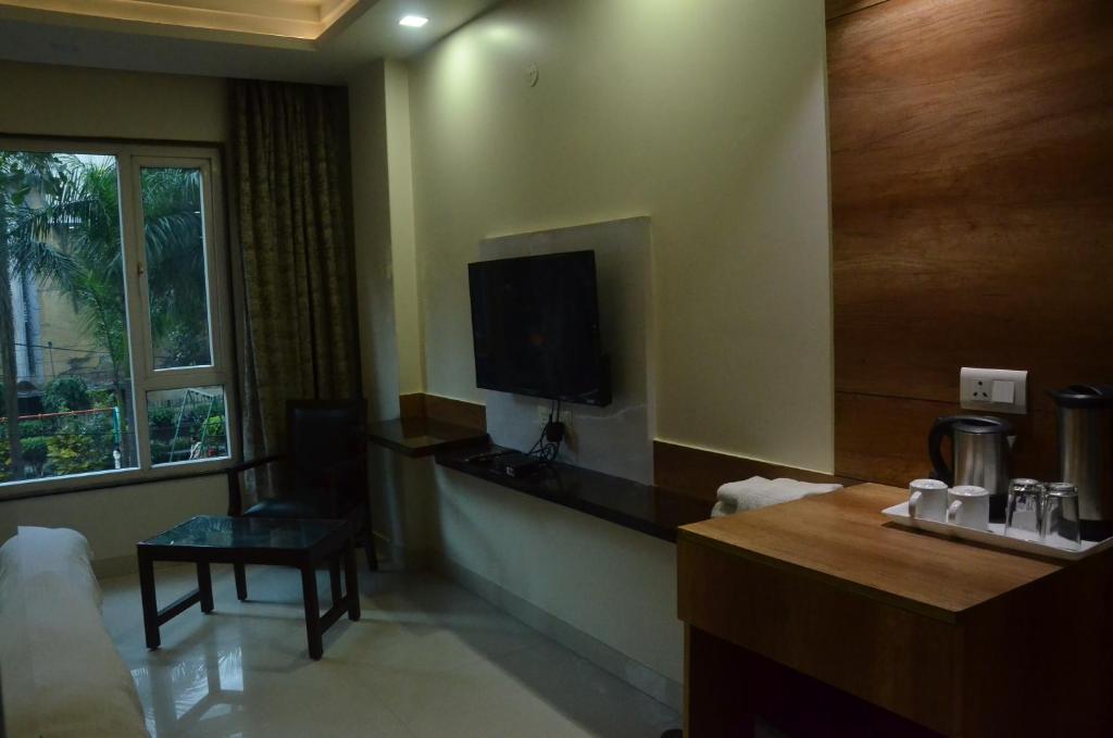 TV a/nebo společenská místnost v ubytování Hotel Sopan Heights