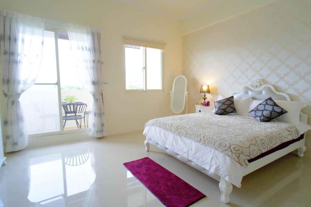 Postel nebo postele na pokoji v ubytování Bai Yun Ge Homestay