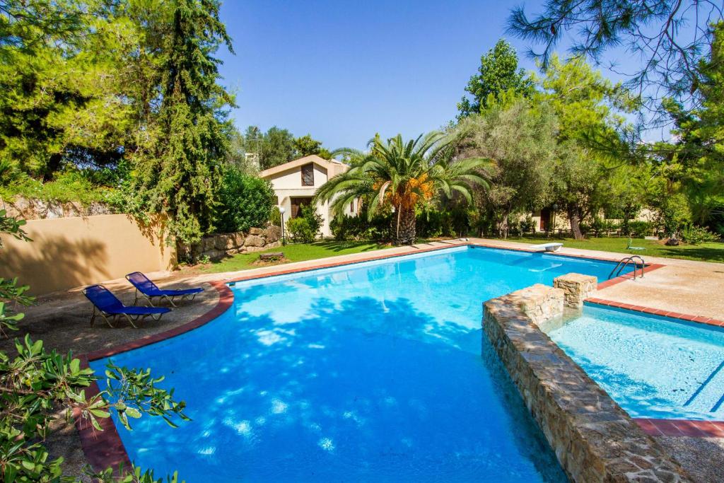 Bazén v ubytování Villa Erato - Your Dream Getaway in Sani Seaside nebo v jeho okolí