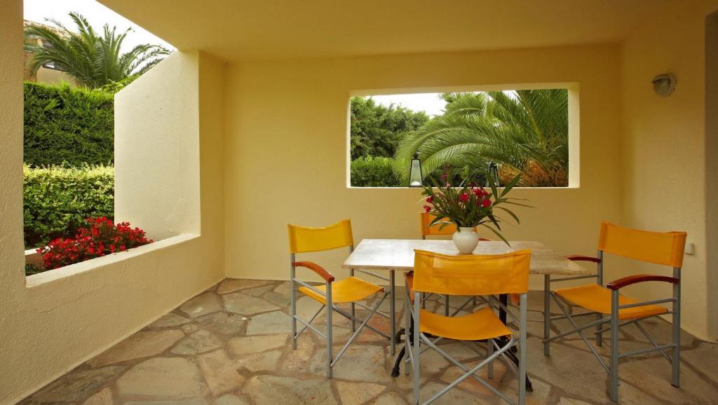 A garden outside Villa Erato - Your Dream Getaway in Sani Seaside