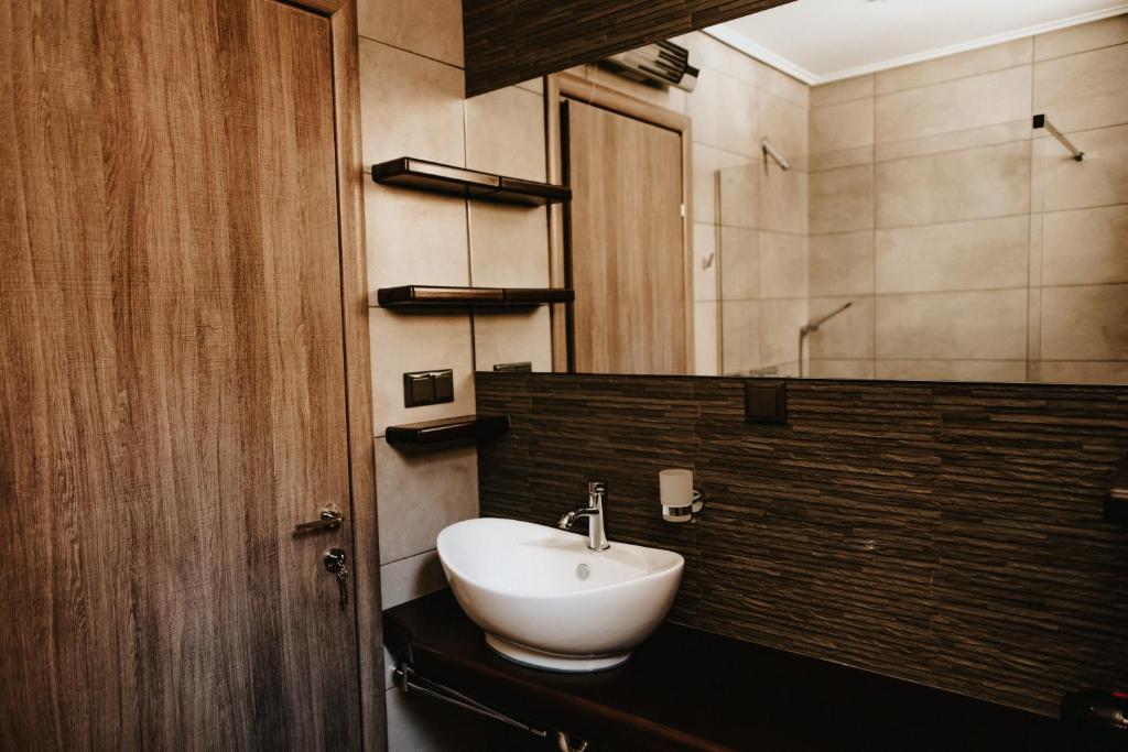 Kúpeľňa v ubytovaní Sivota Luxury Apartments