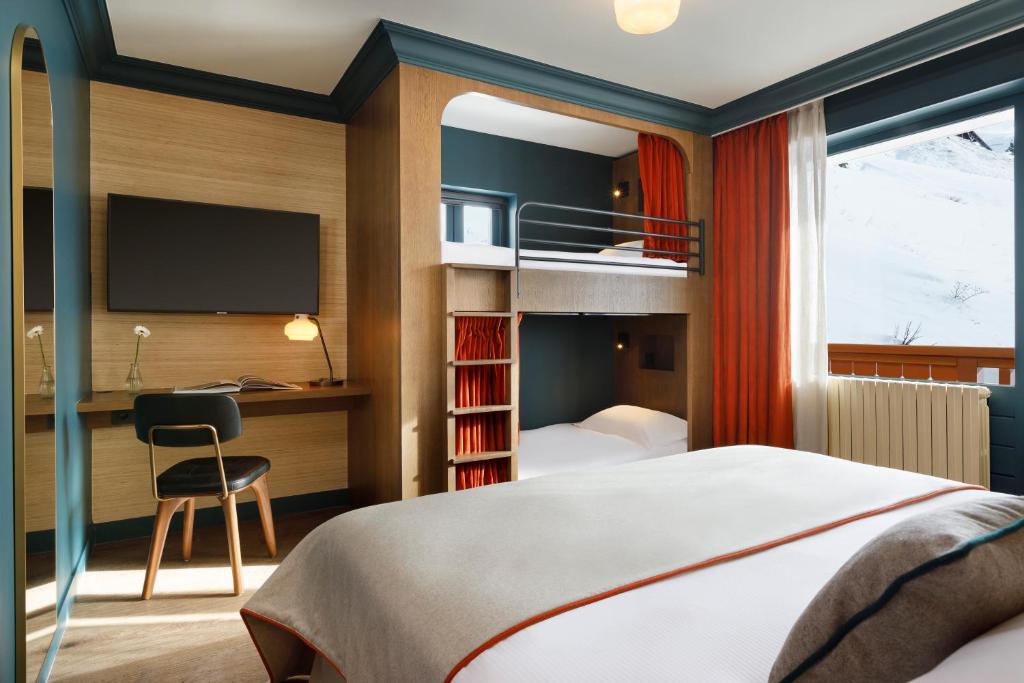 Postel nebo postele na pokoji v ubytování Ours Blanc Hotel & Spa
