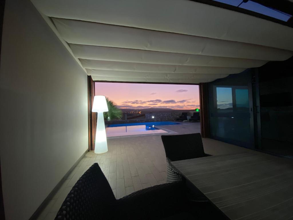 TV a/nebo společenská místnost v ubytování VILLA LOBA WITH PRIVATE POOL
