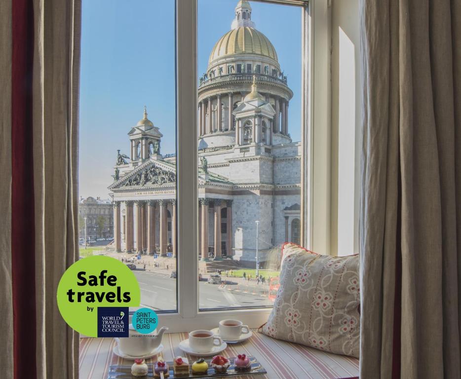 
a large window with a view of a city at Angleterre Hotel in Saint Petersburg
