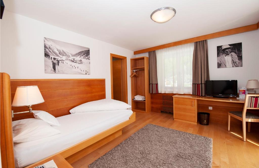 Postel nebo postele na pokoji v ubytování Hotel Eller