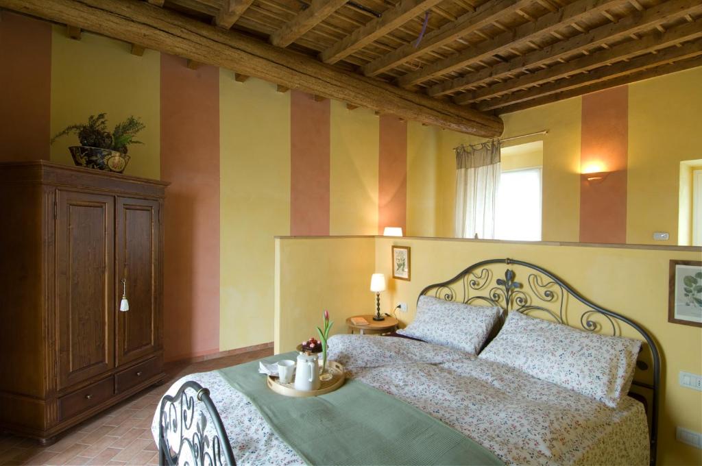 Cama o camas de una habitación en Agriturismo Cascina Maiocca